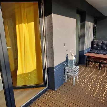 Sloneczny Apartament Winogrady * بوزنان